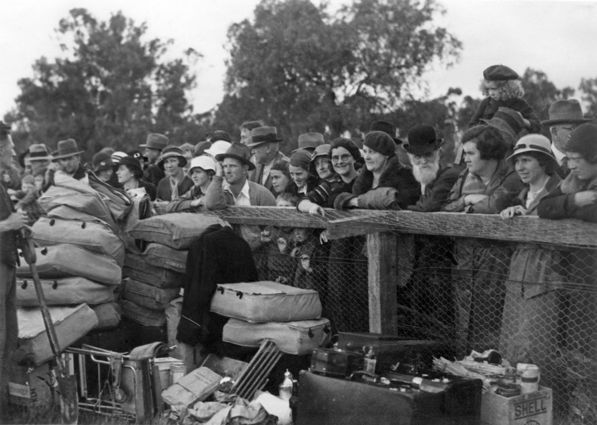  Albury townsfolk with the unloaded contents of the KLM 'Uiver' DC-2 at Albury Racecourse 