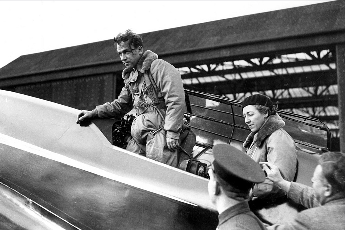  Amy Mollison (Johnson) and Jim Mollison in their de Haviland DH.88 'Black Magic' about to depart Mildenhall (did not finish) 