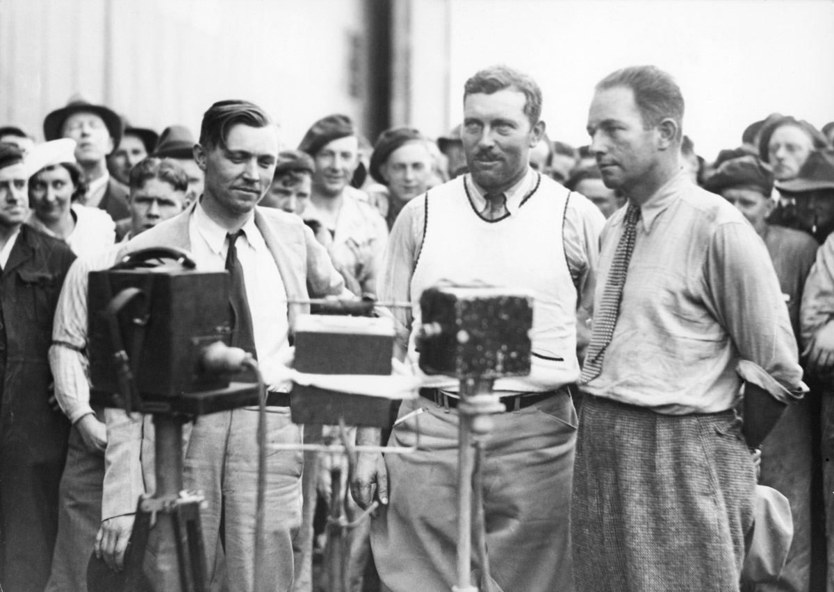  The very tired crew of the Boeing 247D at Laverton, Nichols (L), Turner (C), Pangborn (R) (State Library VIC) 