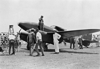  de Havilland DH.88 Comet flown by Owen Cathcart-Jones and Ken Waller refuelling at Darwin (Northern Territory Library) 