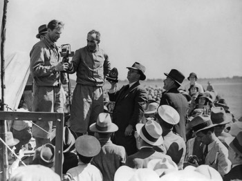  Charles Scott and Tom Campbell Black sharing a cold beverage while speaking to journalists at Charleville (State Library QLD) 