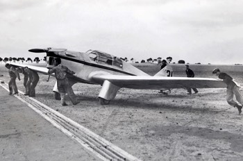  Miles M.3 Falcon flown by British pilot Harold Brook, accompanied by Miss Ella Lay, at Laverton (finished 10th) 